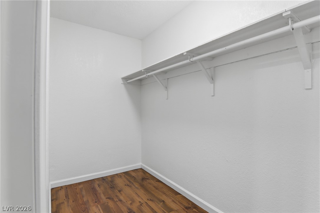 2274 East Desert Inn Road Las Vegas, NV 89169 - Photo 34 of 41 Ample storage solutions abound in this well-appointed, ready-to-organize closet.