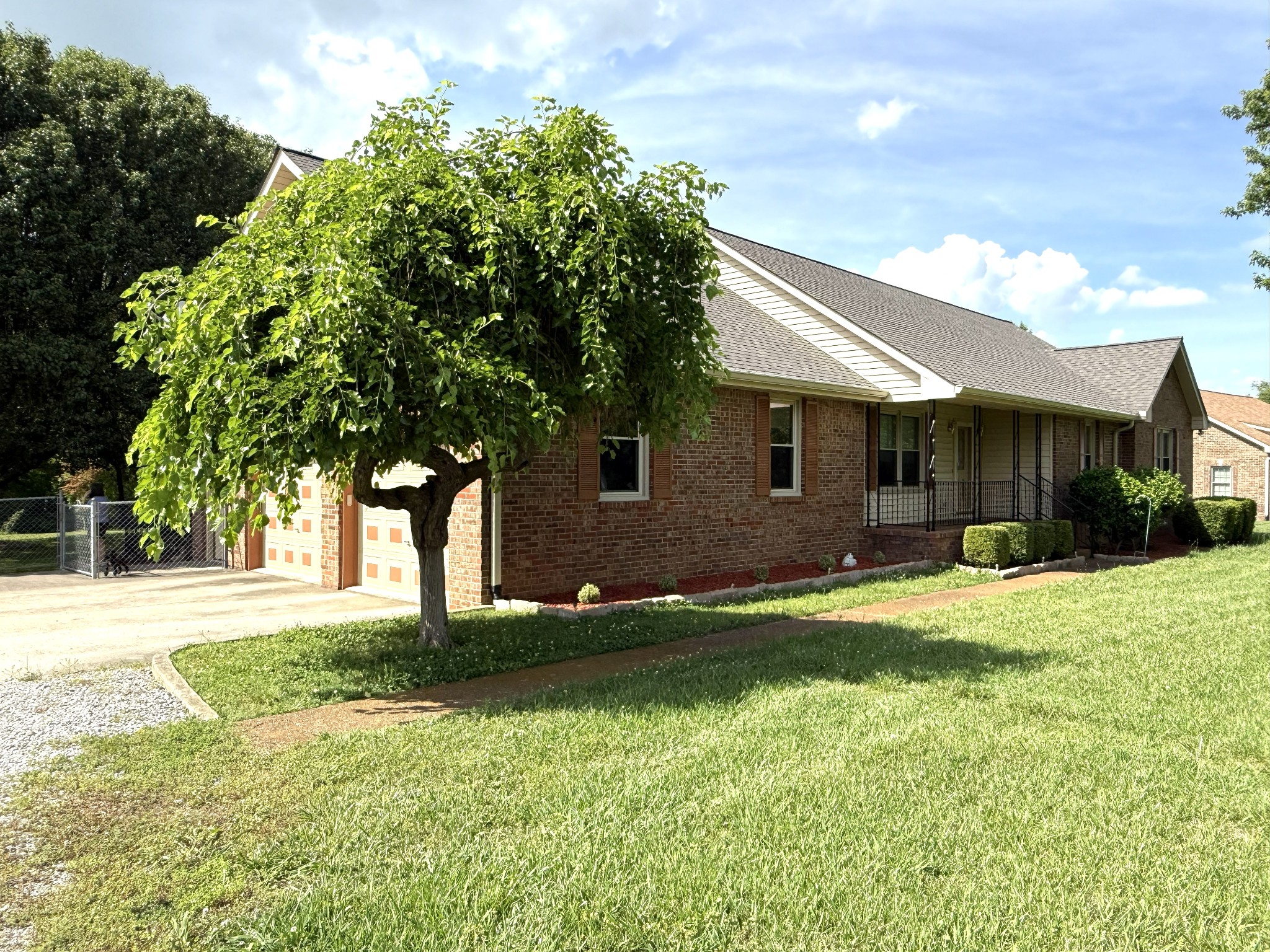 3168 Maxey Road Cedar Hill, TN 37032 - Photo 1 of 40 a front view of a house with a yard