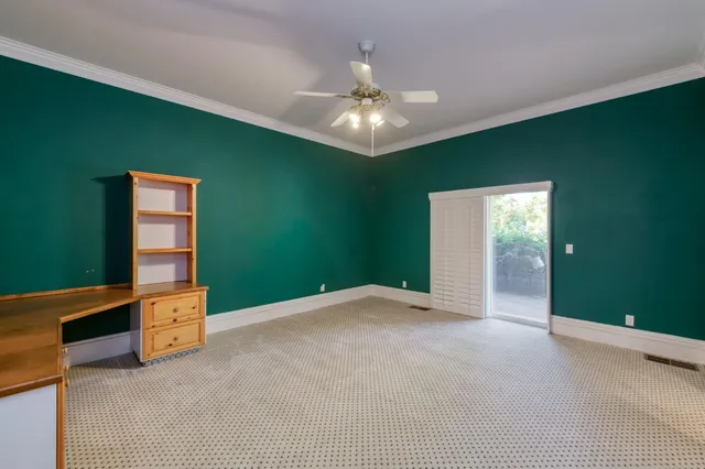 a kitchen with stainless steel appliances granite countertop a stove and a refrigerator
