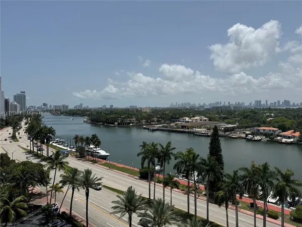 an aerial view of city and lake