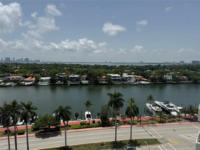 a kitchen with a refrigerator sink and microwave