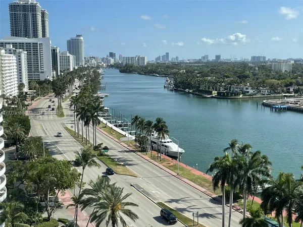 a view of a lake with a city