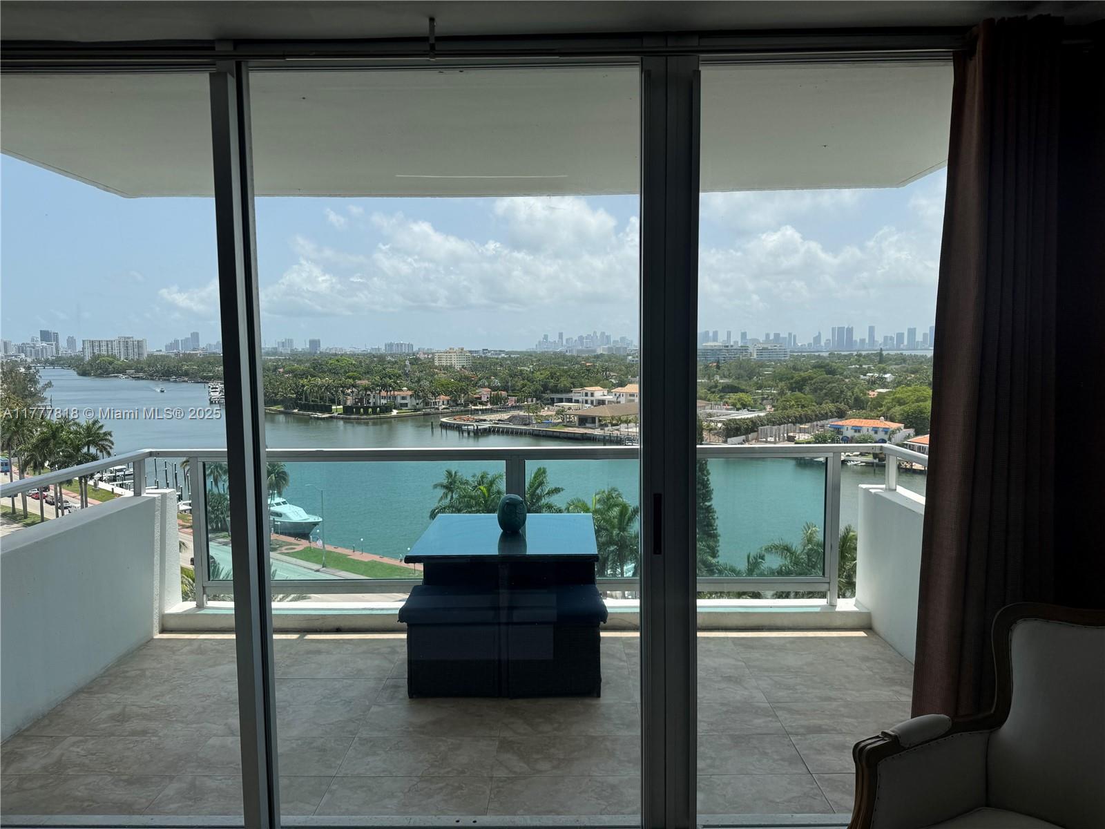 5161 Collins Avenue, Unit 1206 Miami Beach, FL 33140 - Photo 10 of 28 a view of a building from a window