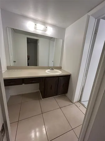 a room with a table and chairs