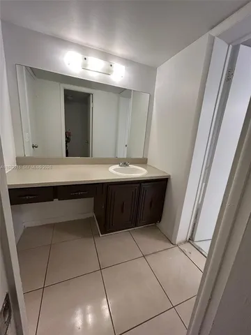 a room with a table and chairs