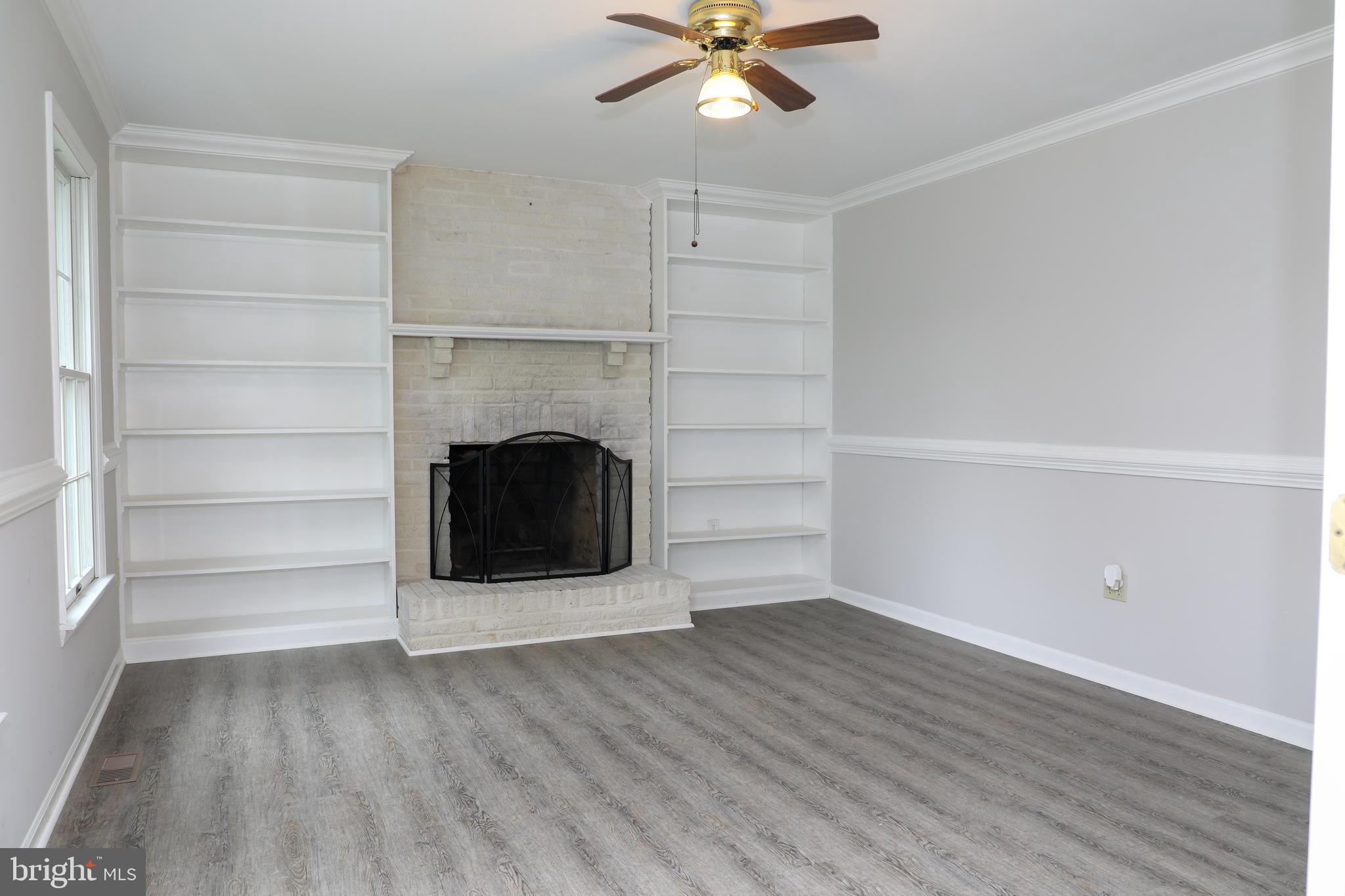 Den w/ Wood burning fireplace