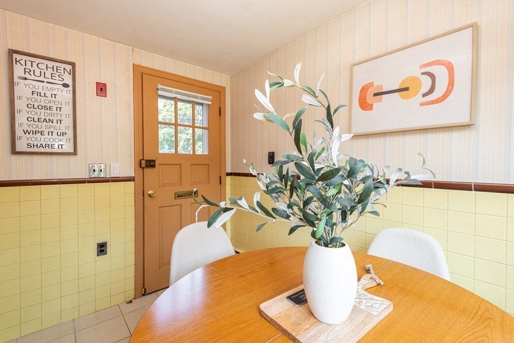 9 Linnea Lane Reading, MA 01867 - Photo 14 of 33 a vase of flowers sitting on a table