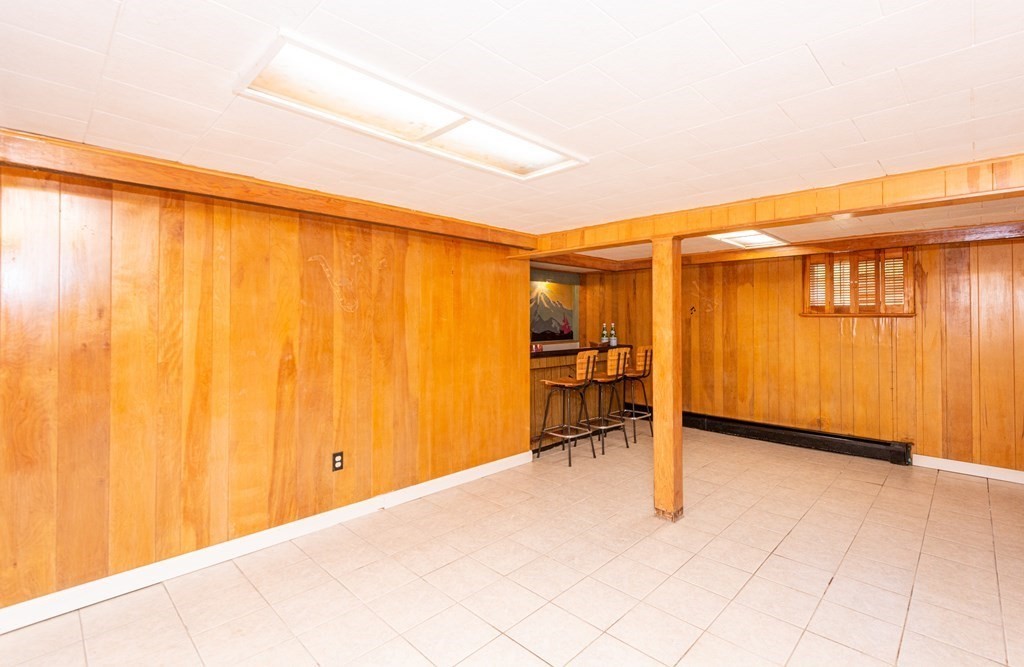 9 Linnea Lane Reading, MA 01867 - Photo 25 of 33 a view of a room with a chair