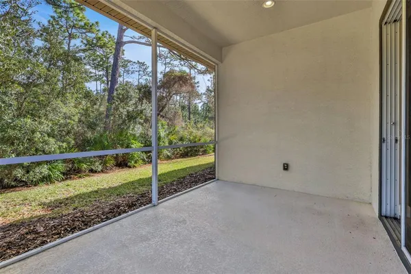 a view of backyard with green space