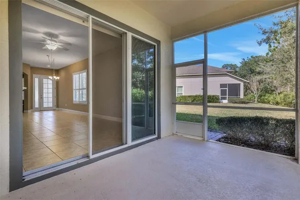 a view of livingroom with furniture and floor to ceiling window
