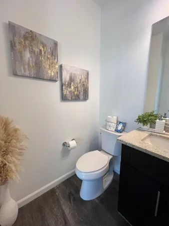a bathroom with a toilet and a sink