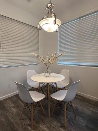 a table and chairs in a patio