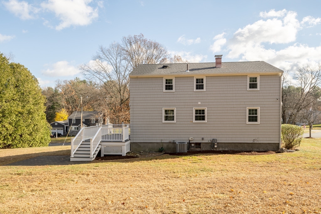 1 Roberts Road Billerica, MA 01821 - Photo 13 of 16 a view of a house with a yard