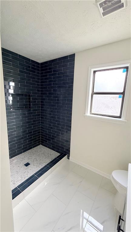 5257 Post Ridge Court Stone Mountain, GA 30088 - Photo 22 of 42 a bathroom with a shower