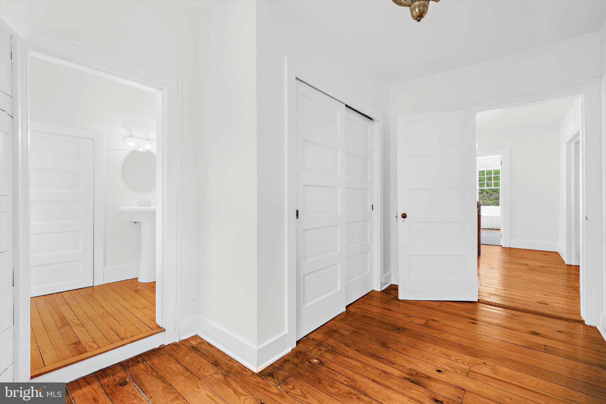 500 Nesbit Road Queenstown, MD 21658 - Photo 34 of 53 a view of room with wooden floor and bathroom