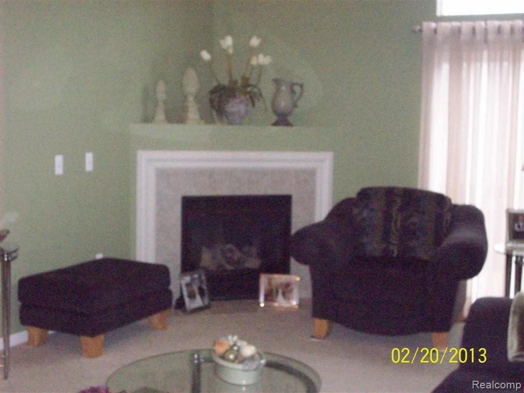 1044 Spirea, Unit 57 Howell, MI 48843 - Photo 3 of 23 Gas fireplace