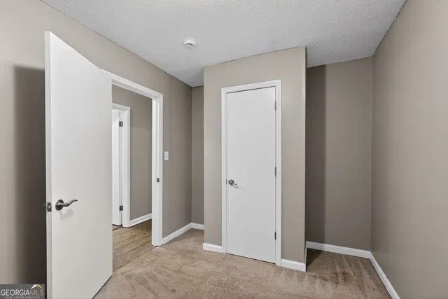 a view of a livingroom with wooden floor