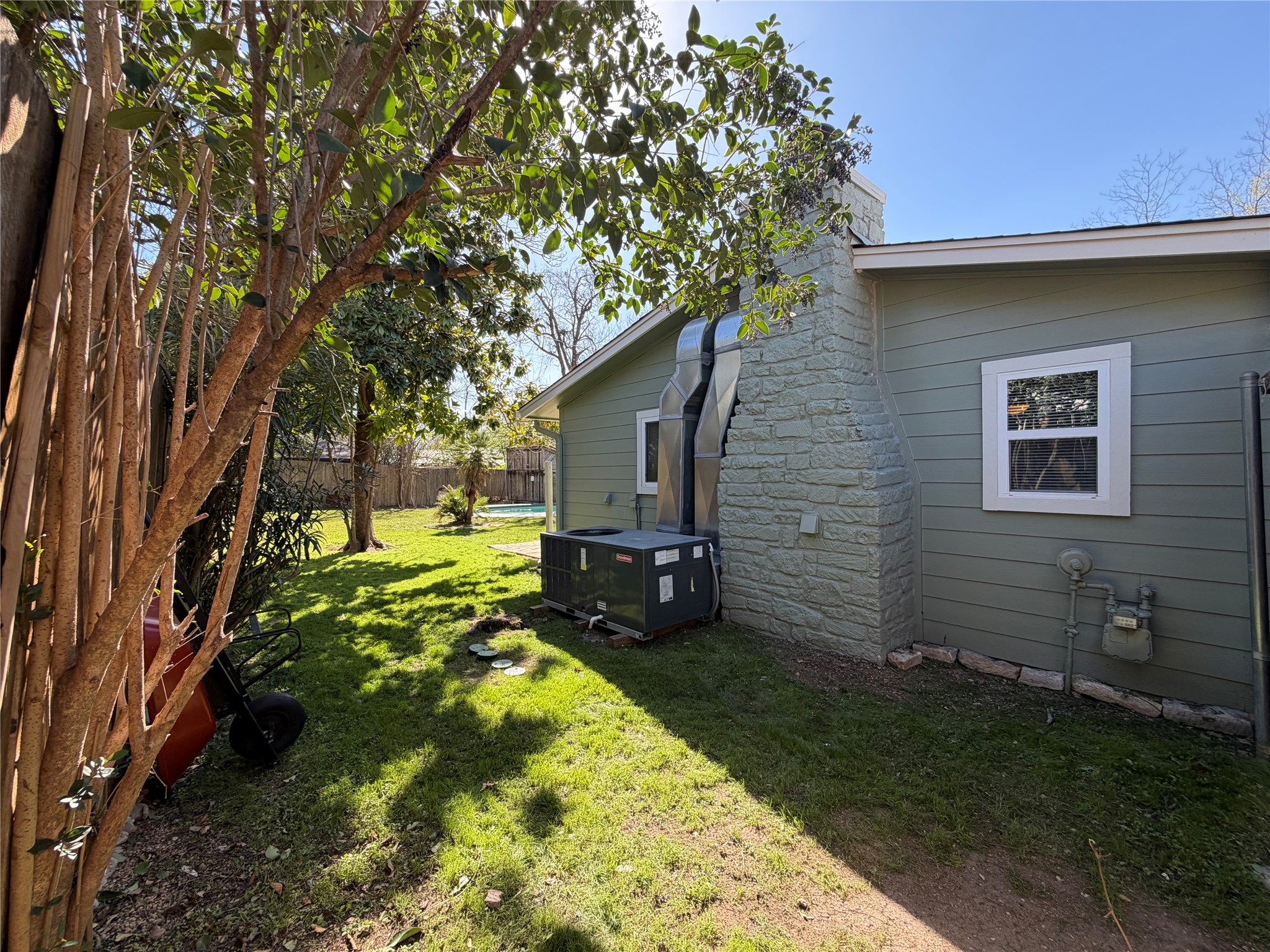 301 Sheraton Avenue Austin, TX 78745 - Photo 19 of 27 Side yard with additional beautiful shade trees in a private setting.