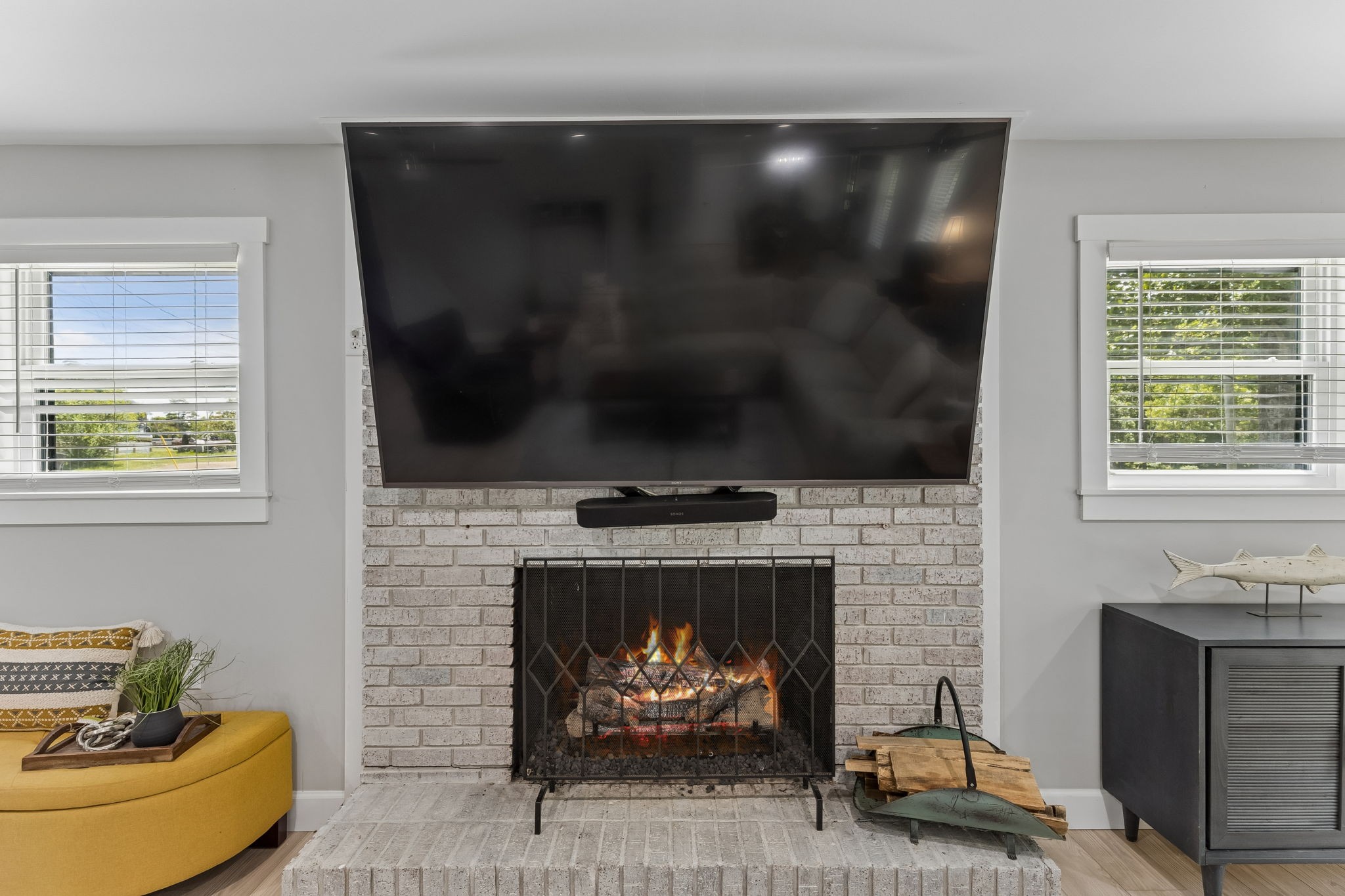 109 Indian Creek Road Hohenwald, TN 38462 - Photo 12 of 69 a living room with furniture and a fireplace
