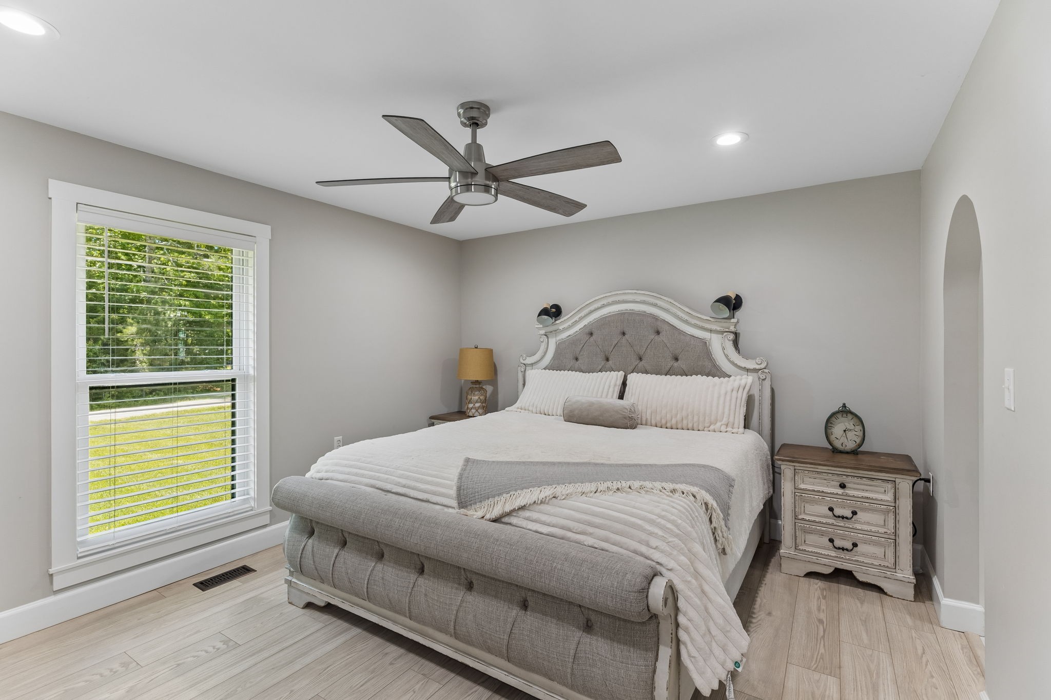 109 Indian Creek Road Hohenwald, TN 38462 - Photo 28 of 69 a bedroom with a bed and a window