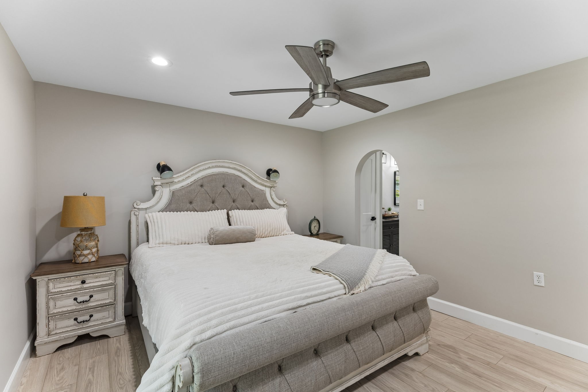109 Indian Creek Road Hohenwald, TN 38462 - Photo 29 of 69 a bedroom with a bed and a dresser