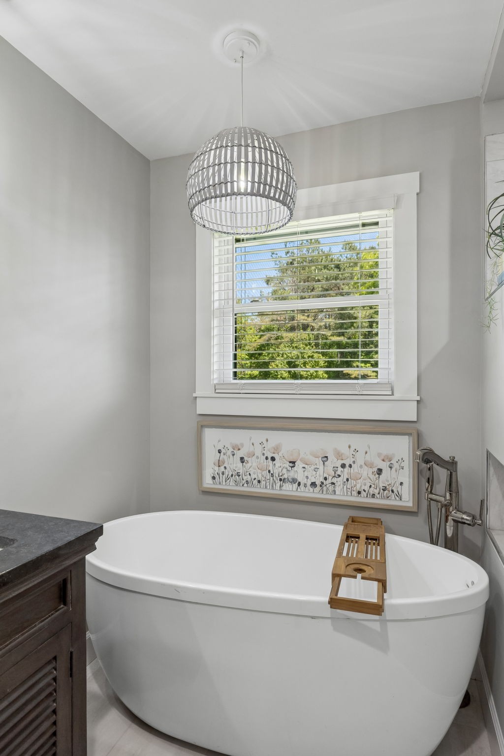 109 Indian Creek Road Hohenwald, TN 38462 - Photo 32 of 69 a bathroom with a bathtub a window and a shower