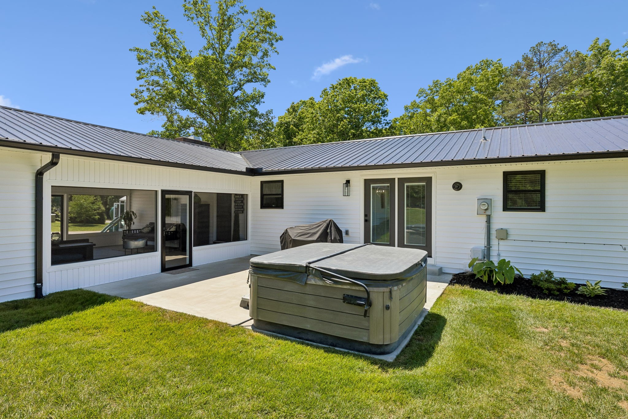 109 Indian Creek Road Hohenwald, TN 38462 - Photo 50 of 69 a front view of a house with patio