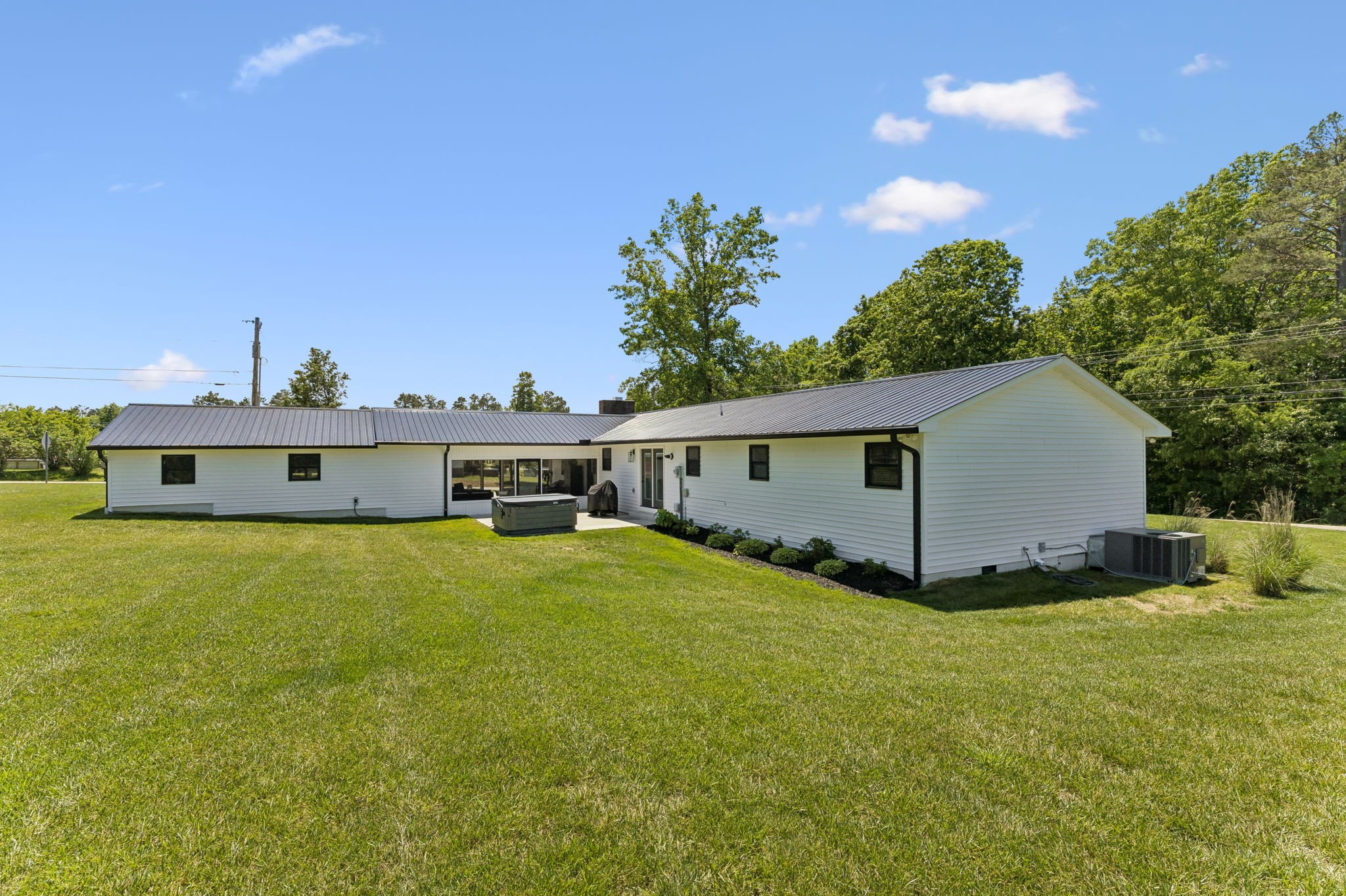 109 Indian Creek Road Hohenwald, TN 38462 - Photo 51 of 69 a house view with a garden space