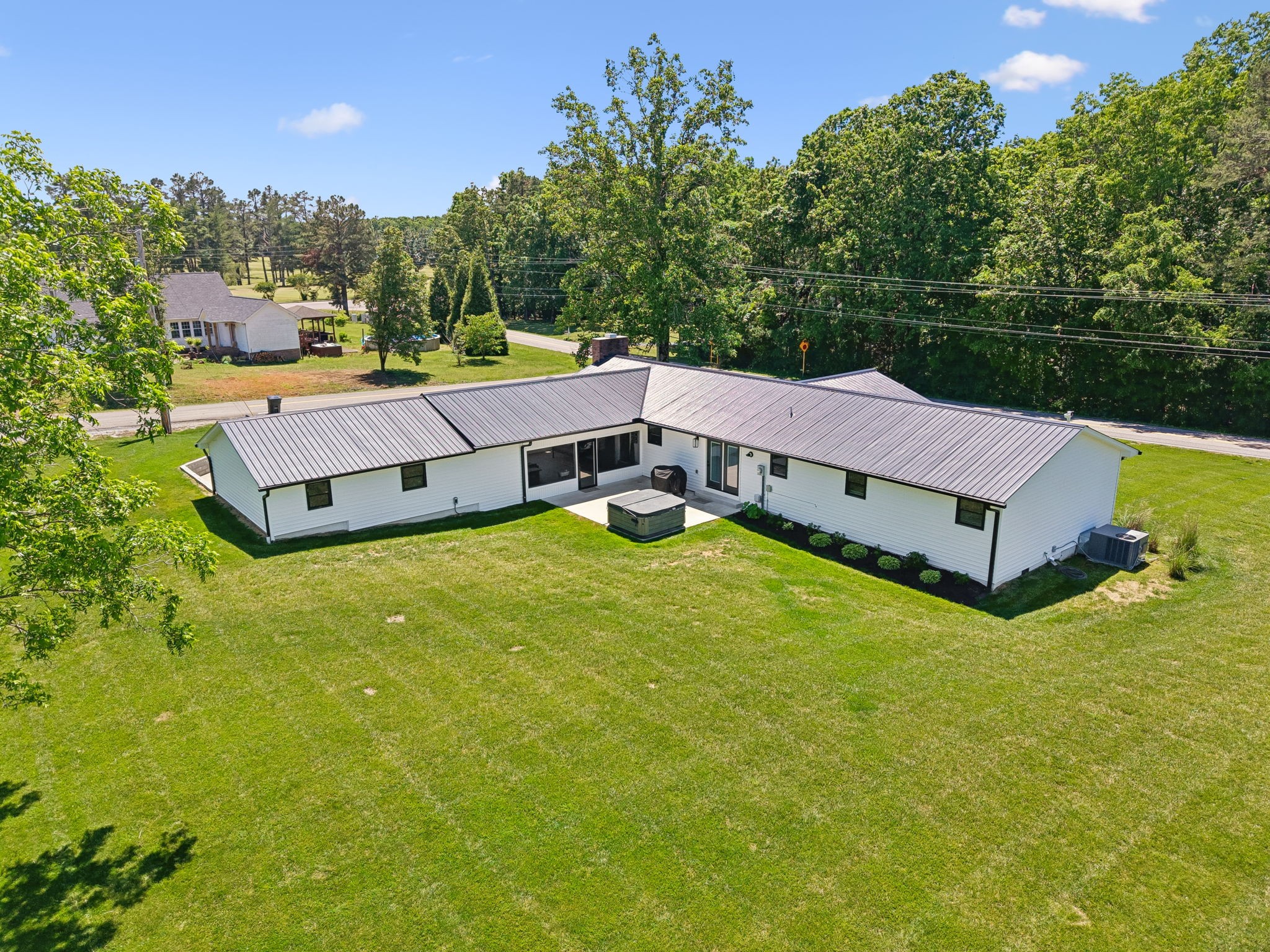 109 Indian Creek Road Hohenwald, TN 38462 - Photo 57 of 69 a house view with a garden space