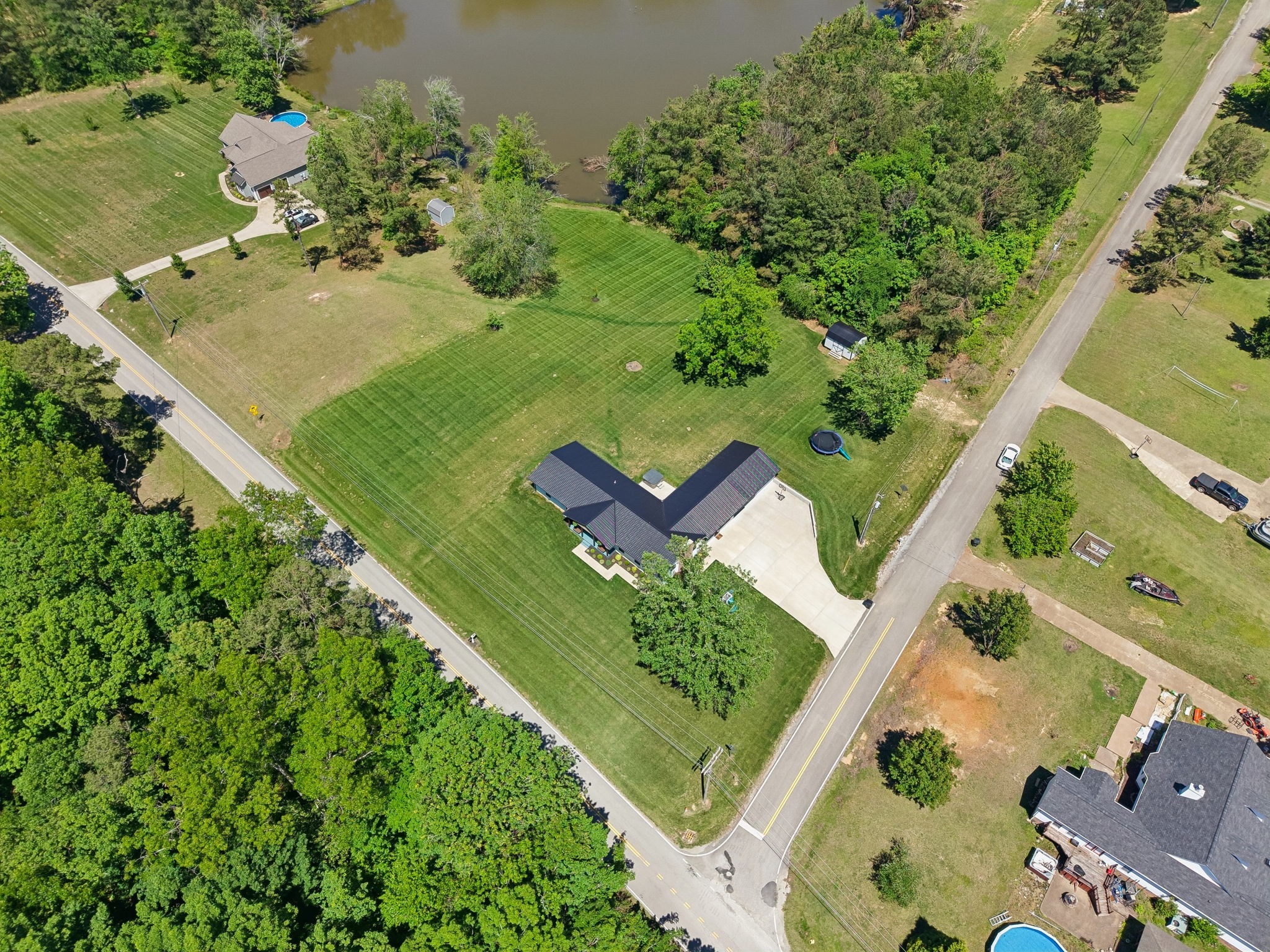 109 Indian Creek Road Hohenwald, TN 38462 - Photo 61 of 69 an aerial view of a residential houses with outdoor space