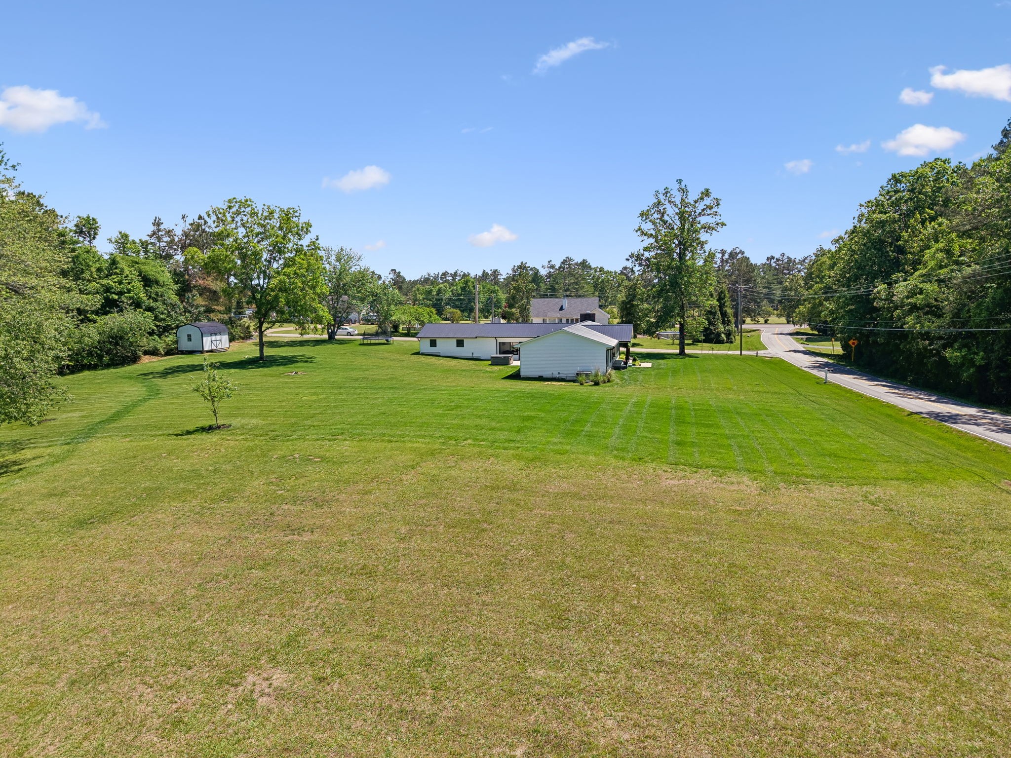 109 Indian Creek Road Hohenwald, TN 38462 - Photo 65 of 69 a view of field with trees in the background
