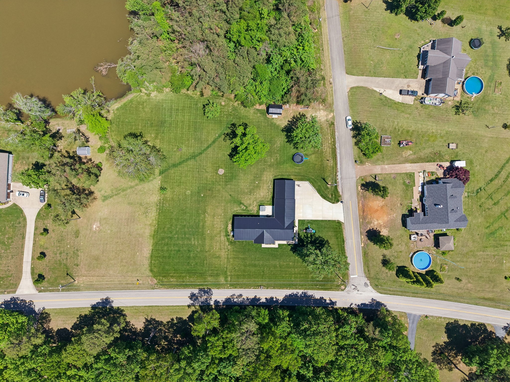109 Indian Creek Road Hohenwald, TN 38462 - Photo 68 of 69 an aerial view of a house with a yard