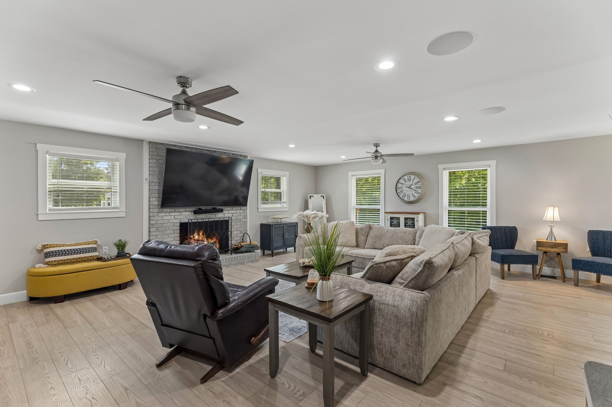 109 Indian Creek Road Hohenwald, TN 38462 - Photo 10 of 69 a living room with furniture and a flat screen tv