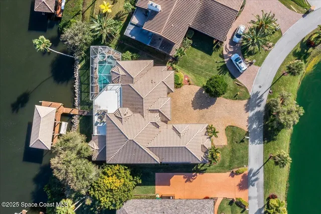 a bathroom with a tub a sink and a window