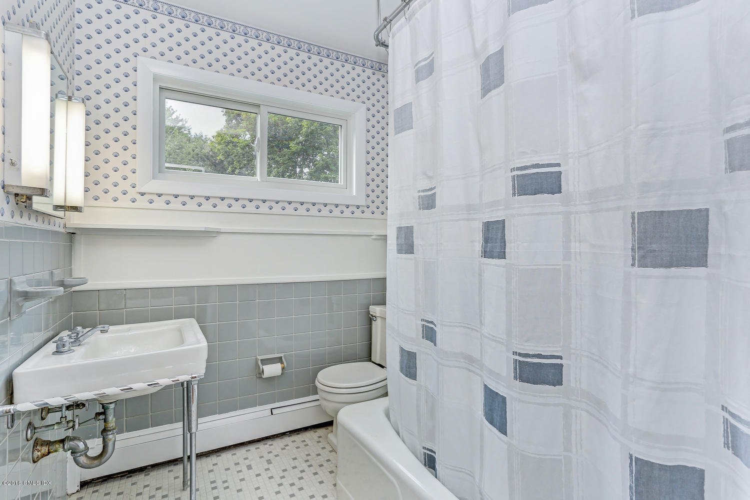 12 Lake Drive, Unit SOUTH Riverside, CT 06878 - Photo 12 of 21 a bathroom with a toilet sink and mirror