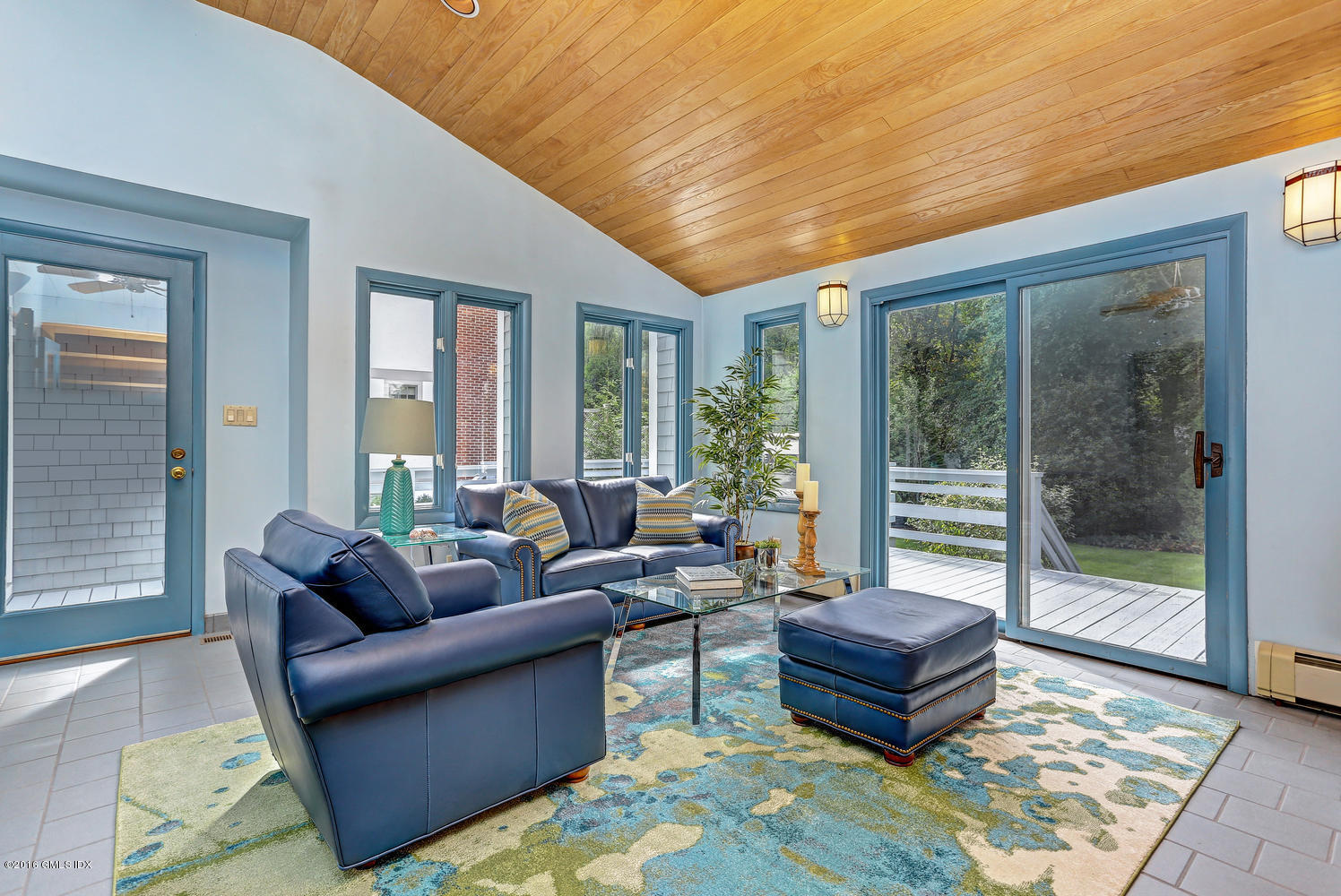 12 Lake Drive, Unit SOUTH Riverside, CT 06878 - Photo 5 of 21 a living room with furniture and a floor to ceiling window