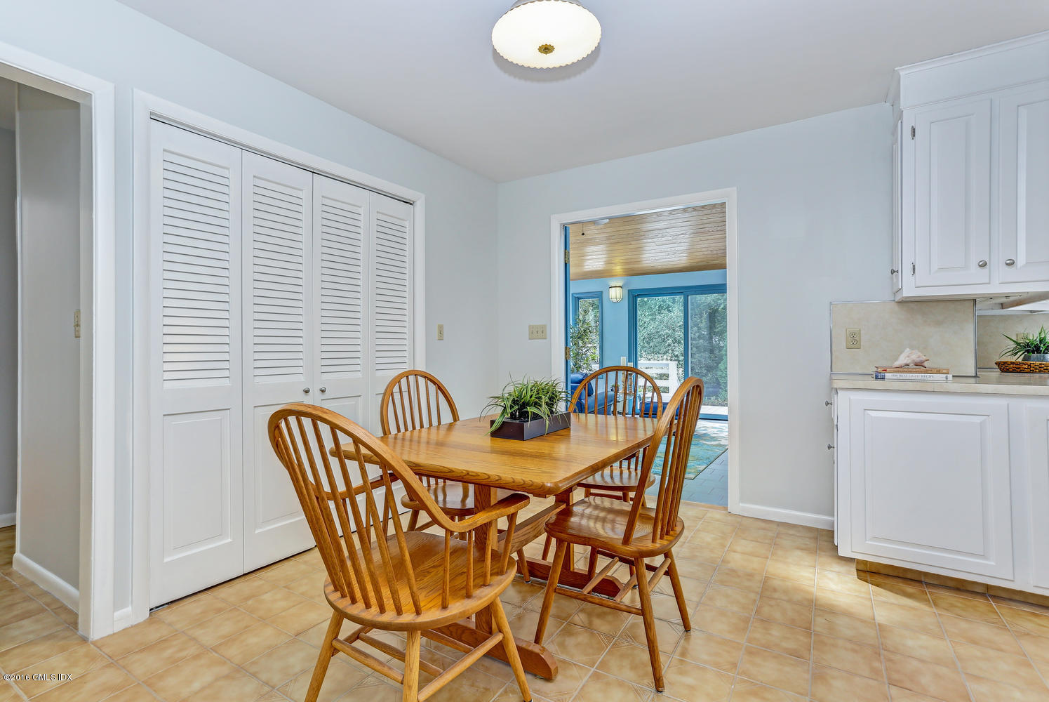 12 Lake Drive, Unit SOUTH Riverside, CT 06878 - Photo 8 of 21 a dining room with furniture and window