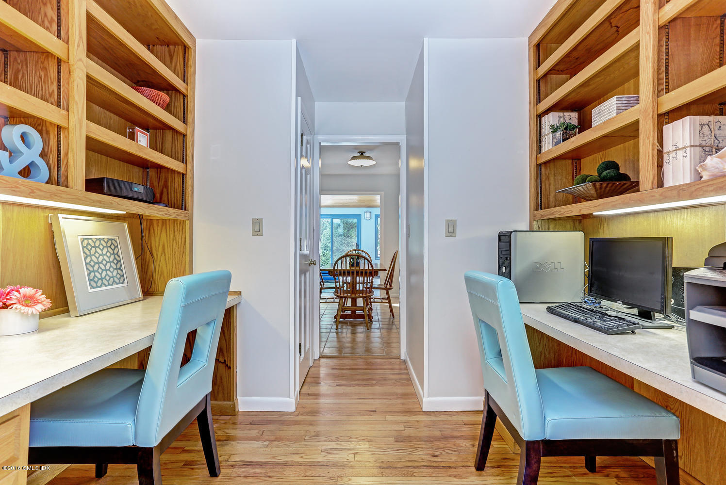 12 Lake Drive, Unit SOUTH Riverside, CT 06878 - Photo 10 of 21 a dining room with furniture and wooden floor