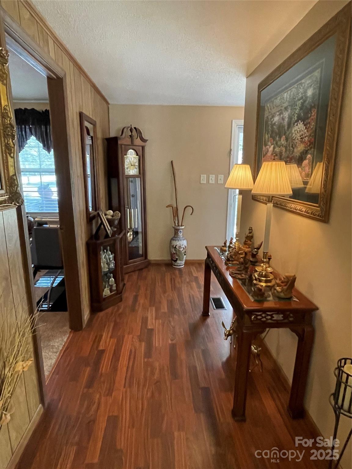 3403 Beaty Road Gastonia, NC 28056 - Photo 12 of 40 a room with wooden floor and furniture