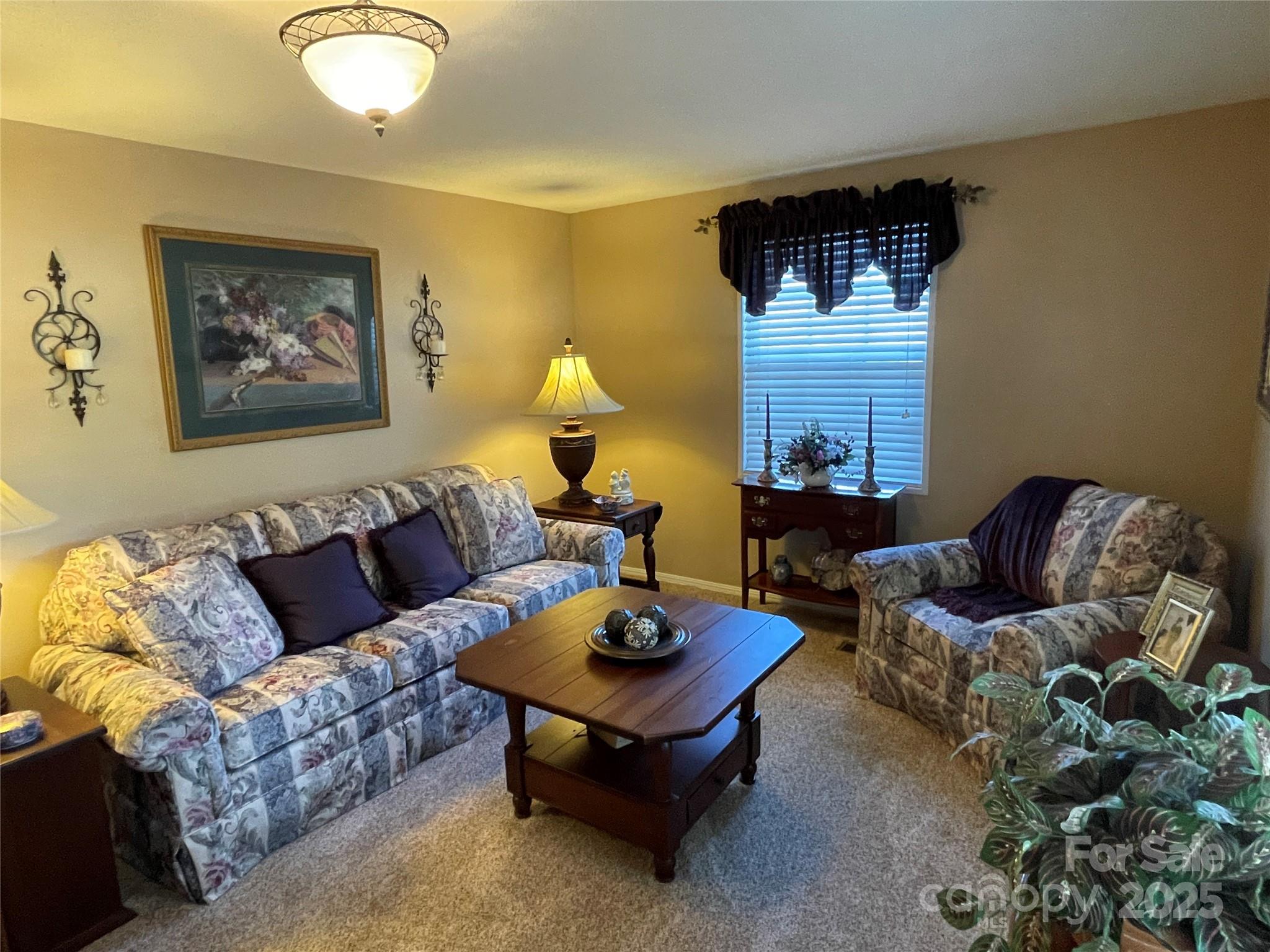 3403 Beaty Road Gastonia, NC 28056 - Photo 14 of 40 a living room with furniture and a wooden floor