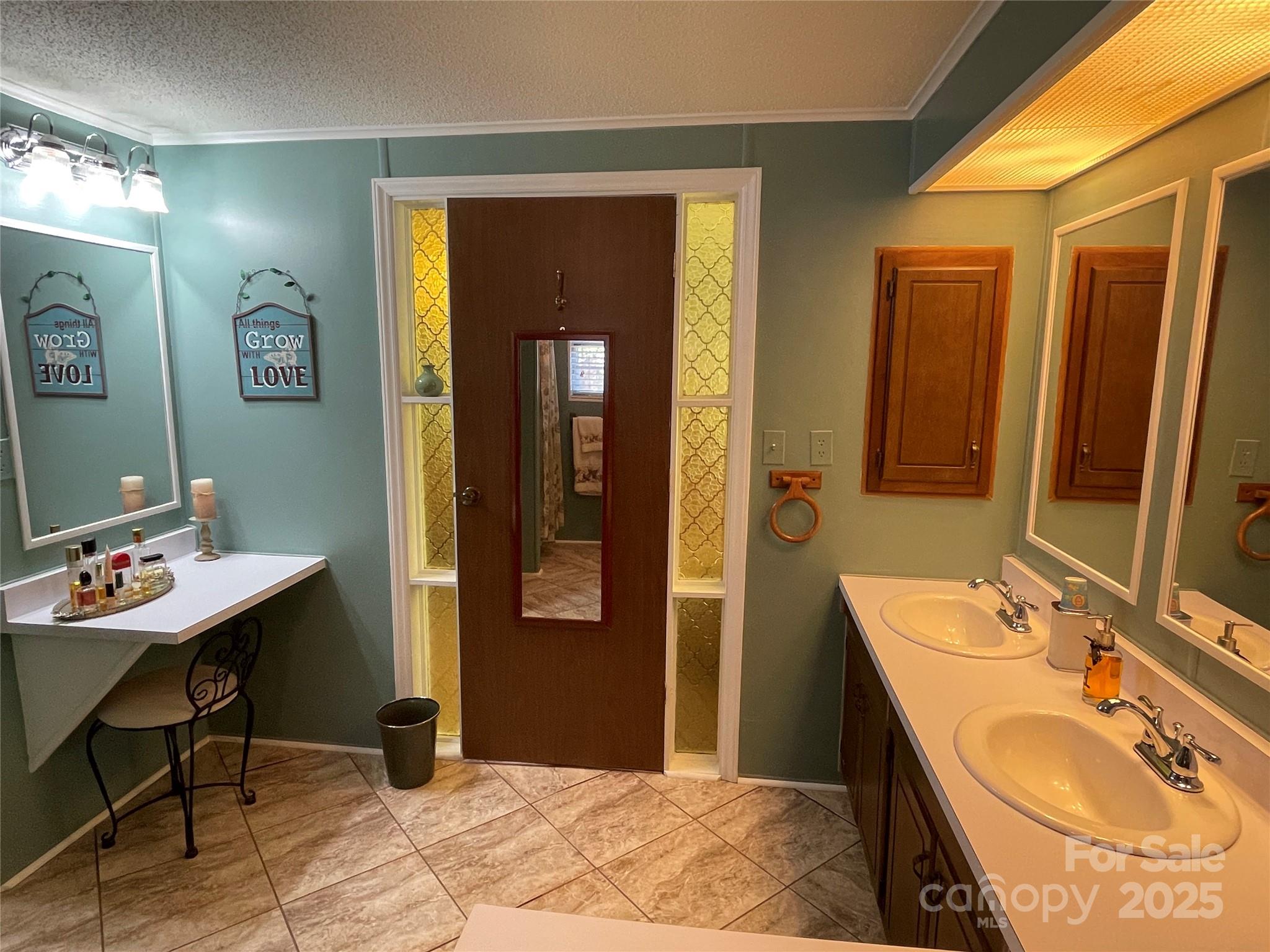 3403 Beaty Road Gastonia, NC 28056 - Photo 25 of 40 a bathroom with a sink vanity and a mirror