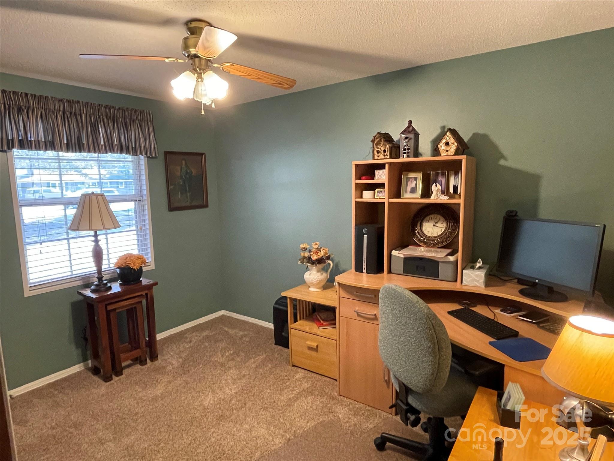 3403 Beaty Road Gastonia, NC 28056 - Photo 27 of 40 a work room with furniture and a window