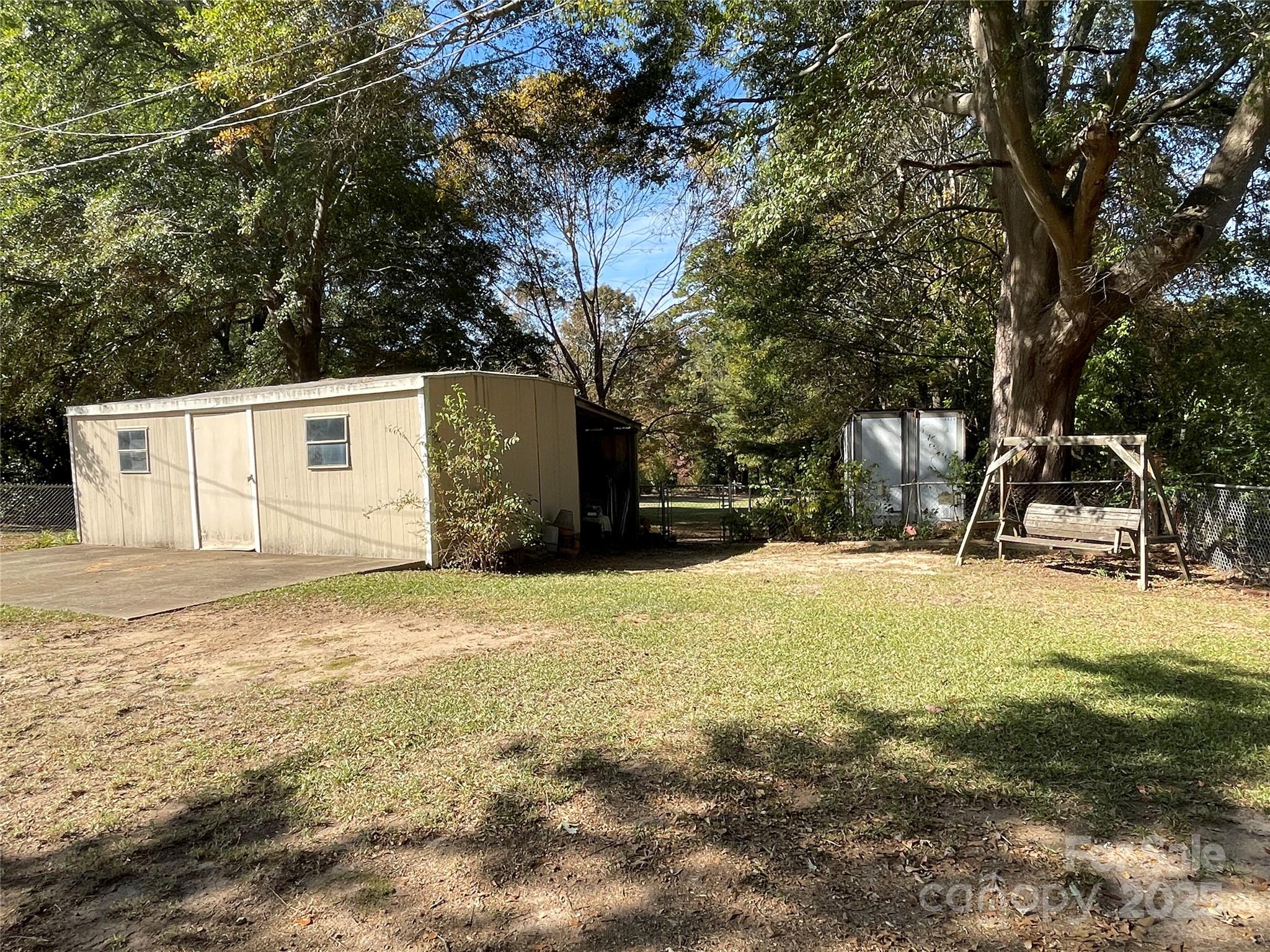 3403 Beaty Road Gastonia, NC 28056 - Photo 34 of 40 a view of a yard with a tree