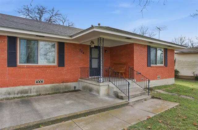 a front view of a house with garage
