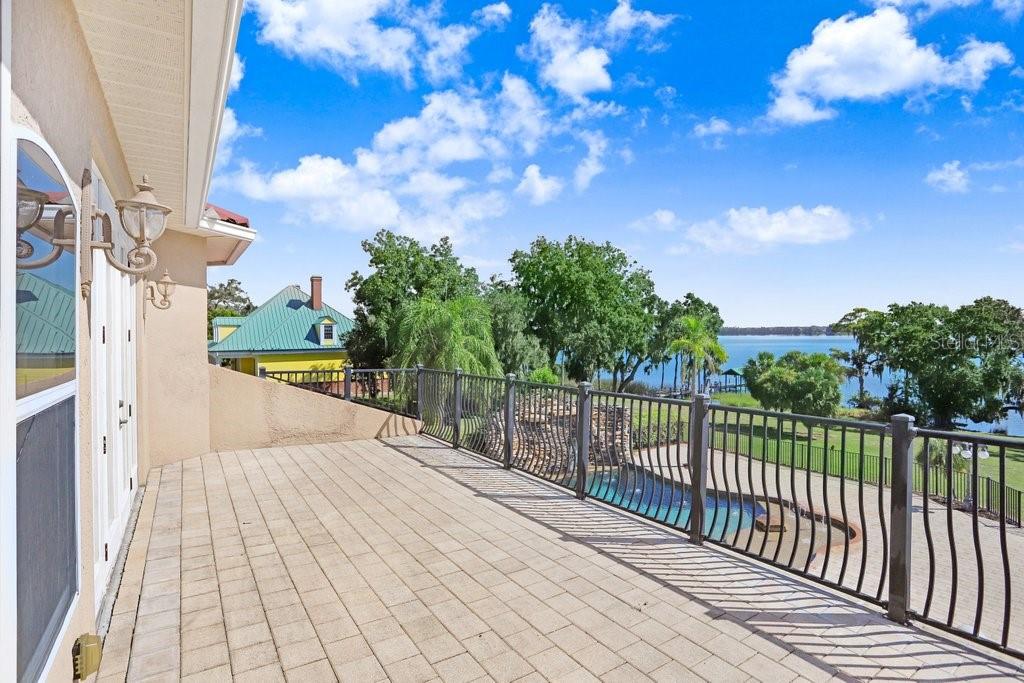 11715 Taylor Road Thonotosassa, FL 33592 - Photo 25 of 73 a view of a pathway with a wrought fence