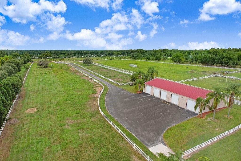 11715 Taylor Road Thonotosassa, FL 33592 - Photo 66 of 73 a view of a lake with a building in the background