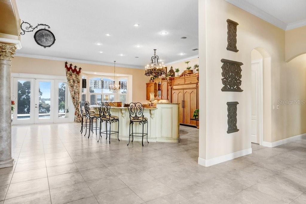 11715 Taylor Road Thonotosassa, FL 33592 - Photo 10 of 73 a view of a lobby with furniture and floor to ceiling window