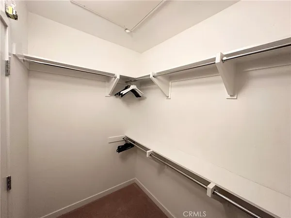 a view of a room with rack on the wall