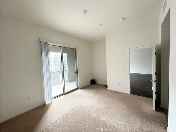 a bathroom with a shower and a bath tub