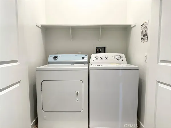 a view of a bathroom from a hallway